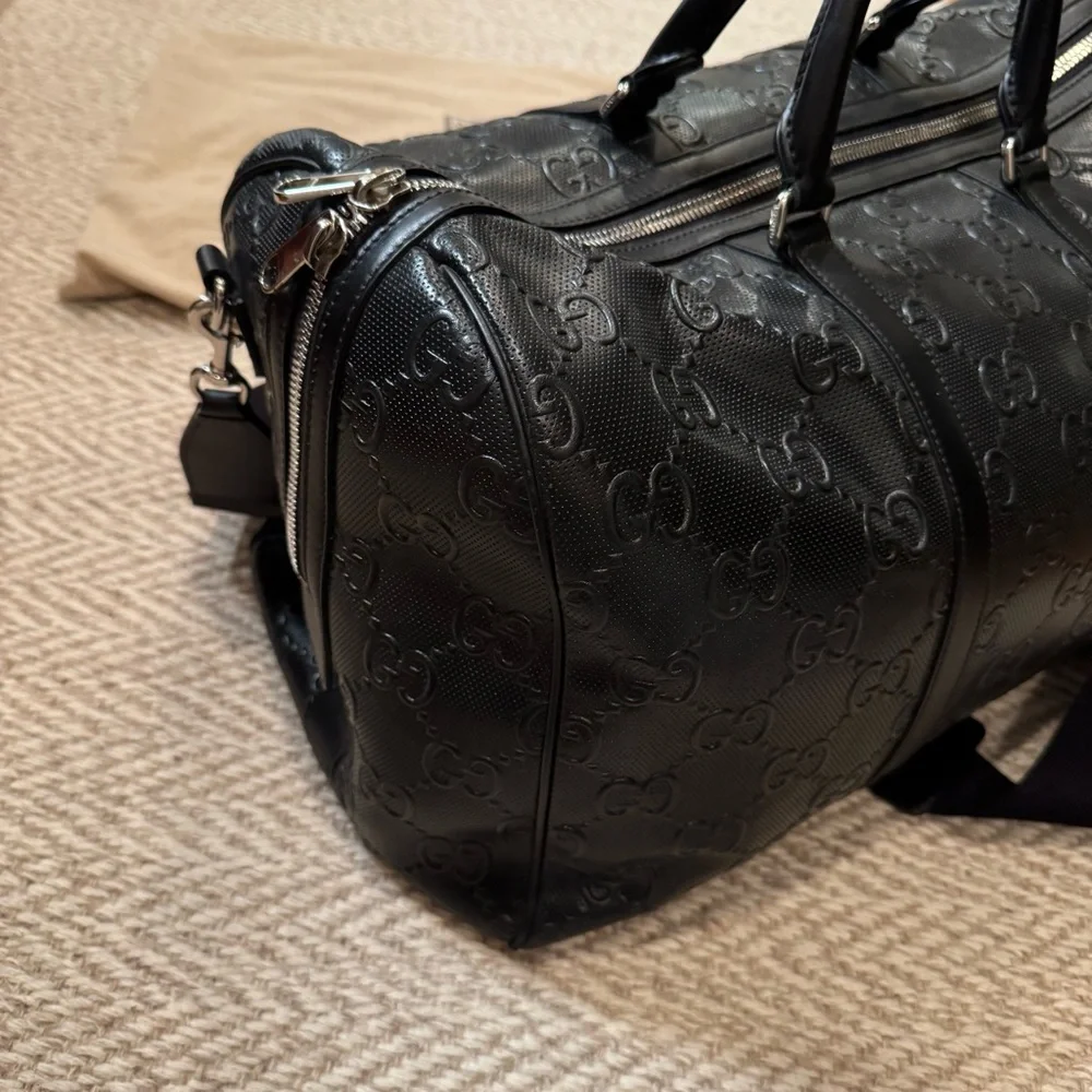 New! Gucci GG embossed black leather duffel bag